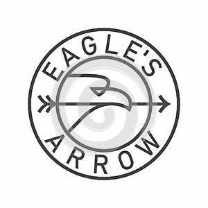 Eagle hold arrow in beak emblem in circle