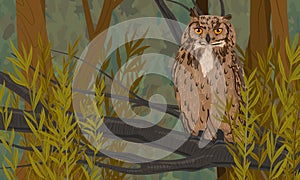 Eagle owl sits on a tree branch in a dense green summer forest. Predatory bird