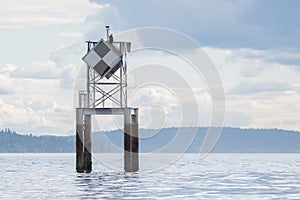 Eagle perched on Duwamish Head Daymark, Seattle, WA