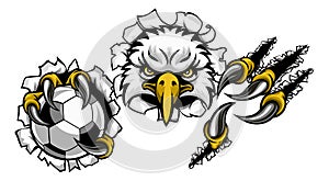 Eagle Soccer Cartoon Mascot Ripping Background photo