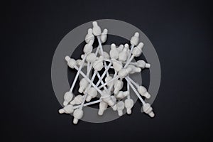 ear buds isolated on black background