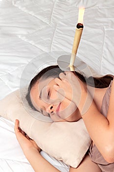 Ear candle treatment
