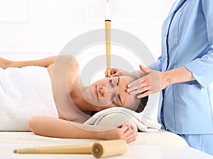 Ear candling, natural purifying treatment