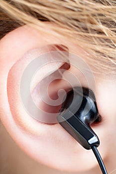 Ear with Earbud