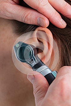 Ear examining
