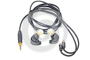 In-ear headphones for Hi-Fi music player. Audio sound and modern equipment for music lovers and audiophiles