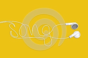 In ear headphones writing song on yellow