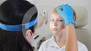 Ear, nose, throat examining. ENT doctor with male child. otolaryngology. Female pediatrician examines boy. Pediatrician