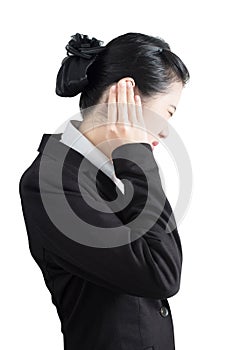 Ear pain symptom in a businesswoman isolated on white background. Clipping path on white background.