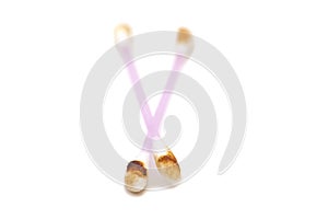 Ear wax on cotton swabs