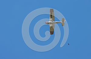 Light plane G-BOSO - Cessna A152 Aerobat flying over Earlswood Surrey on July 31, 2020