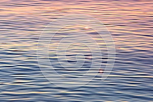 Early evening sun shimmering on calm water