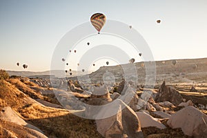 Early morning balloon tourist spectacle in Cappadocia, Turkey