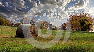 Early morning fall landscape with hay bales