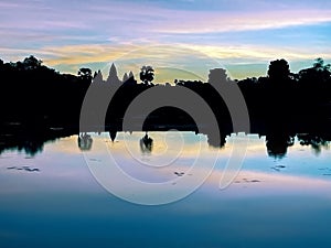 Early Morning Glow: Sunrise silhouette at Angkor Wat, Siem Reap, Cambodia