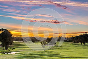 Early morning at the golf course with a beautiful sky