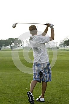 Early Morning Golfer