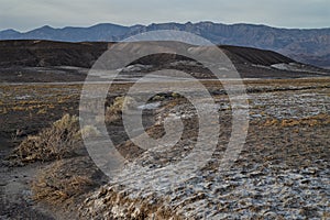 Early morning landscape view borax salt flats Mojave Desert, Death Valley, California USA