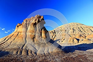 Early Morning Light on Hoodoos in Badlands Landscape along Grand Coulee Trail, Dinosaur Provincial Park, Alberta, Canada