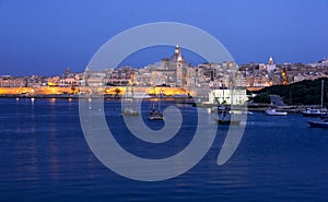 Early morning lights of Valletta Grand Harbour from Sliema