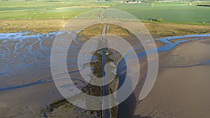 Early morning over the causeway to Holy Island of Lindisfarne, Northumberland