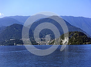 Early morning panorama of Alpine Lake Como against the backdrop of the Alps
