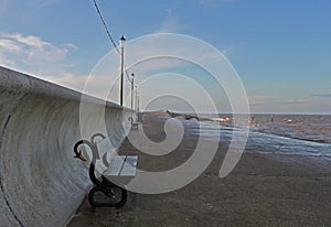 Early morning promenade showing sea defences.