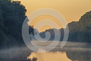 Early morning river. fog trees. sunlight mist water. Olanesti Moldova Dniester river reflection, beautiful summer landscape