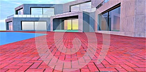 Early morning. Stylish red brick tile in front of the entrance to the country concrete house. Rising sun reflected in the glass