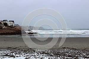 Early morning sunrise with crashing waves along the shore, York Beach, Maine, 2018