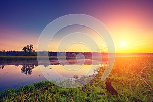 Early in the morning, sunrise over the lake