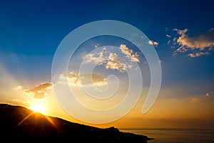 Early morning , sunrise over mountain. Picturesque view of beautiful sunrise at black sea. Gold sea sunrise landscape.