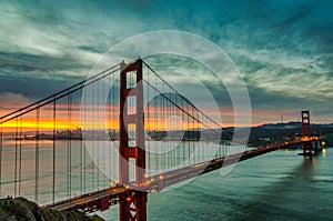 Early morning sunrise over San Francisco behind the Golden Gate Bridge.