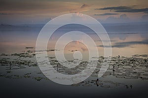 Early morning sunrise in Thailand beautiful  Sunrise on manmade dam Khun Han Sisaket Province Thailand Asia