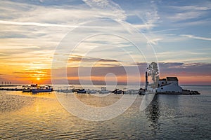 Early morning sunrise view of famous VlachernÐ° monastery, Pontikonissi or mouse island and fisherman boats in Halikiopoulou