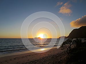 Early Morning Sunrise on Waimanalo Beach over Rabbit Island burs