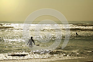 Early morning surfers