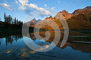 The early morning Teton mountains reflected on String Lake in Grand Teton National Park.