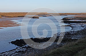 Early Morning, tides out, overlooking Marshland.