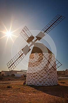 Early morning in a traditional windmill in the village of Valles de Ortega, facing the plains of Mafasca, Fuerteventura, Canary