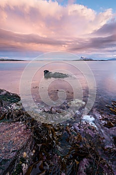 An early morning vertical seascape photographed at sunrise