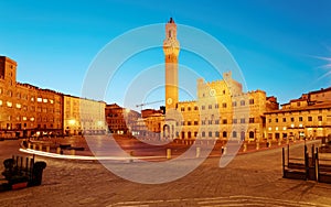 Early morning view of beautiful Campo Square Piazza del Campo in the center of Siena, a medieval town in Tuscany Italy,