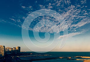 Early morning view of a dramatic clouds over the coastal cityscape of Alexandria in Egypt