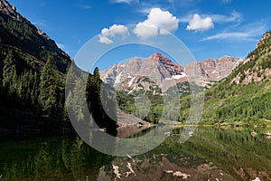 An Early Morning View of the Maroon Bells on Maroon Lake in Mid Summer.