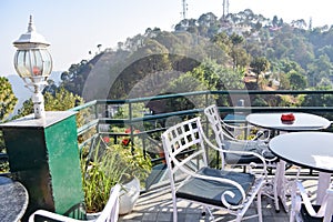 Early morning view of Modern rooftop restaurant at Kasauli, Himachal Pradesh in India, View of mountain hills from open air