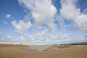 An early morning walk on a beautiful sunny day along the causeway overlooking the huge Fleet lagoon while the tide is out