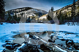 Early snow in early fall at Mount Lorret Ponds. Bow Valley Wildlife Park. Alberta Canada photo