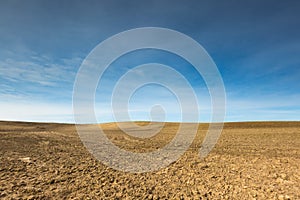 Early springtime plowed field landscape