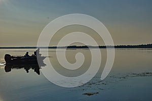 Early summers morning boating  on the lake