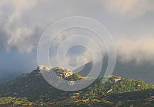 Early sun on a rocky hilltop